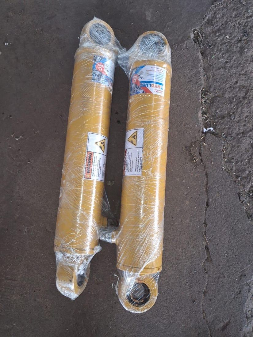 Yellow hydraulic cylinders