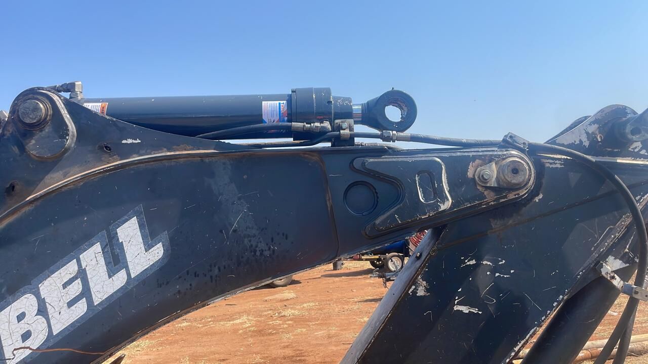 Hydraulic cylinders on a Bell excavator boom
